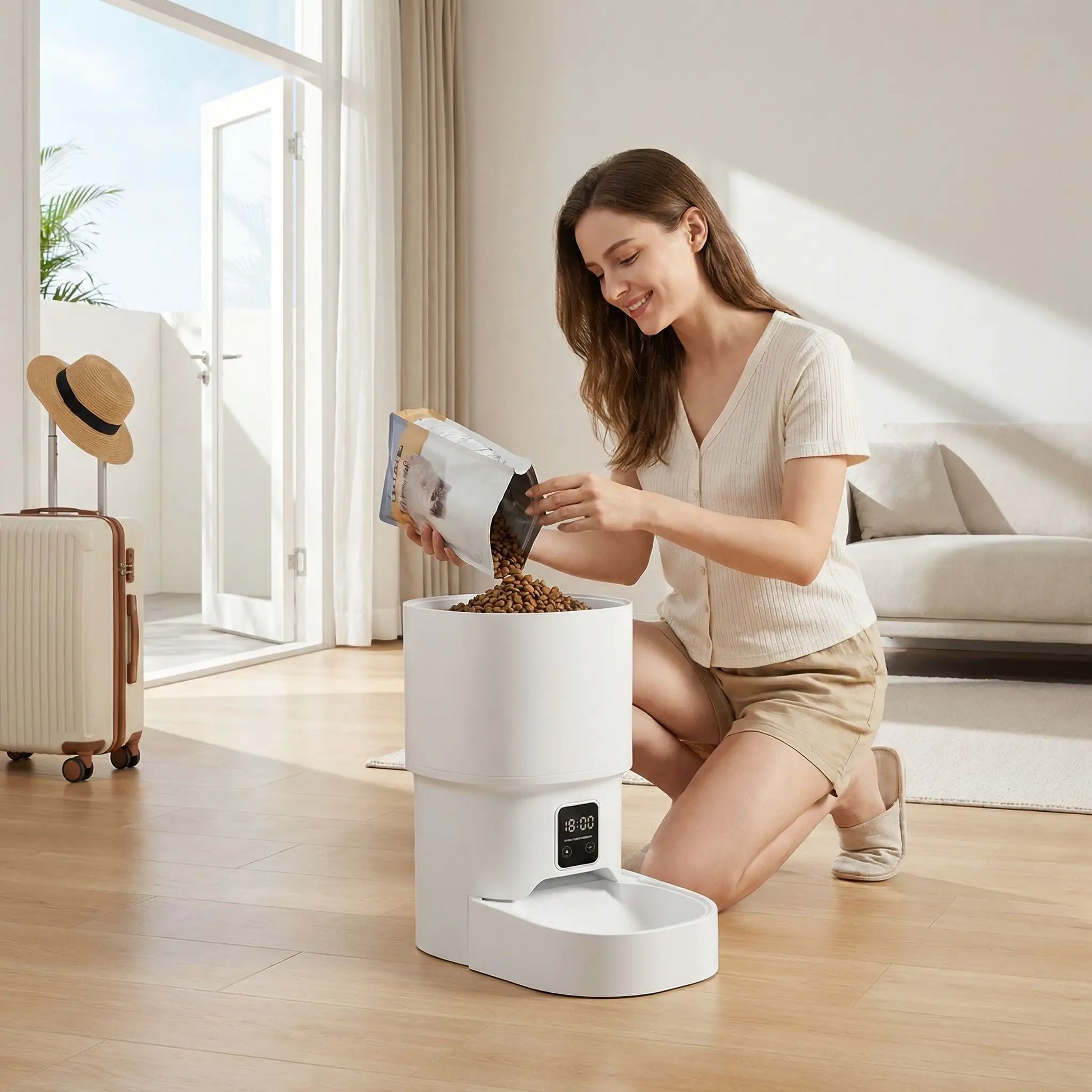 distributeur automatique de croquettes chat connecté